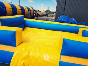 location du ventriglise Palmiers double pistes, jeu d'eau gonflable pour enfants et adultes sur Toulouse et toute la France proposé par id2loisirs